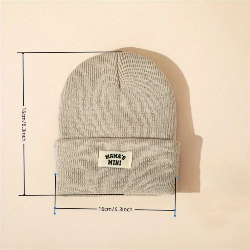Kids' gray knitted beanie with folded cuff and MAMA'S MINI patch visible
