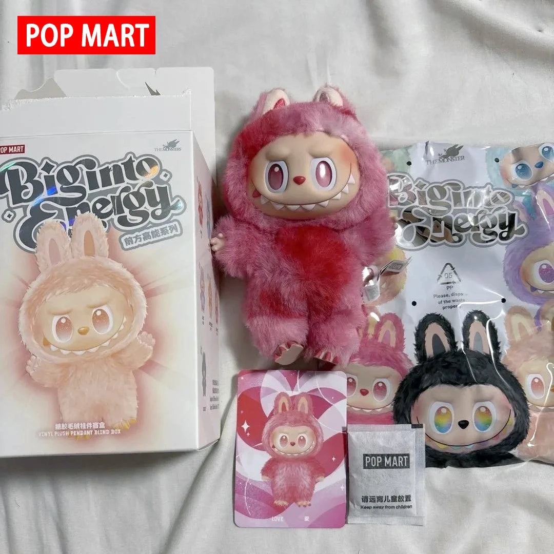 Labubu plush dolls set in macaron pink from POP MART; includes boxed pink character, additional plush and accessories.