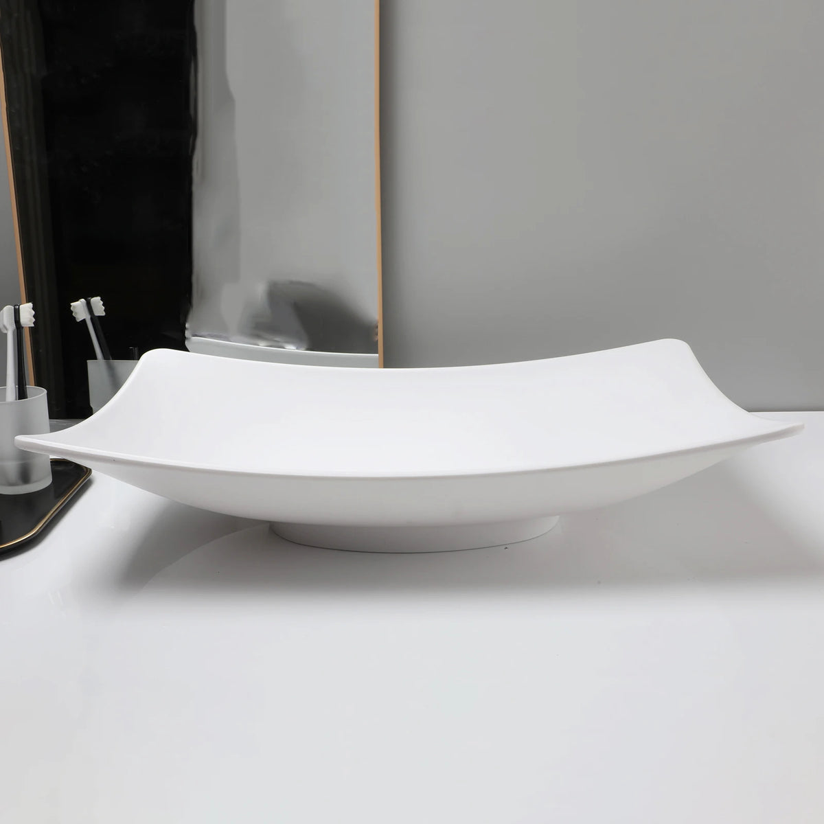 ZAPPO bathroom vessel sink, white stone-resin washbasin with round above-counter bowl, no faucet.