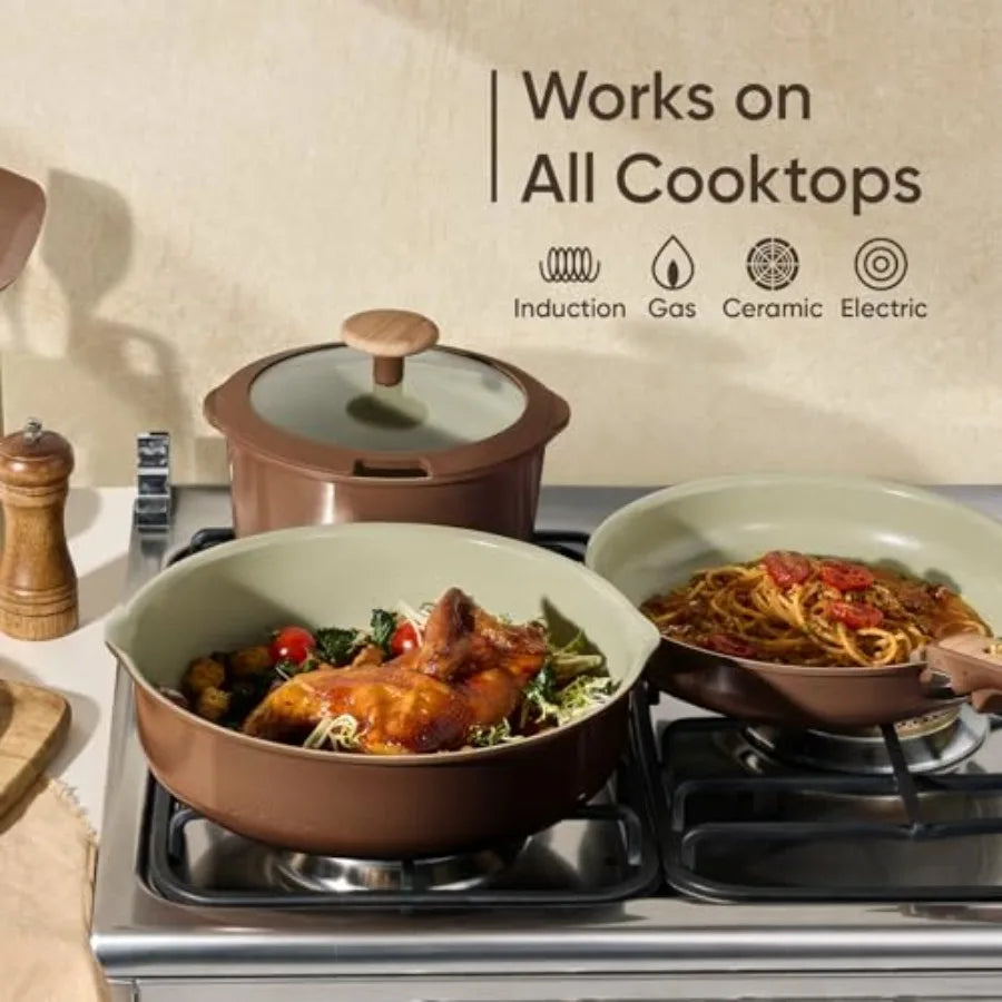 3-piece brown ceramic cookware set on stove with detachable handle; includes pot with lid and two pans, induction and oven safe.