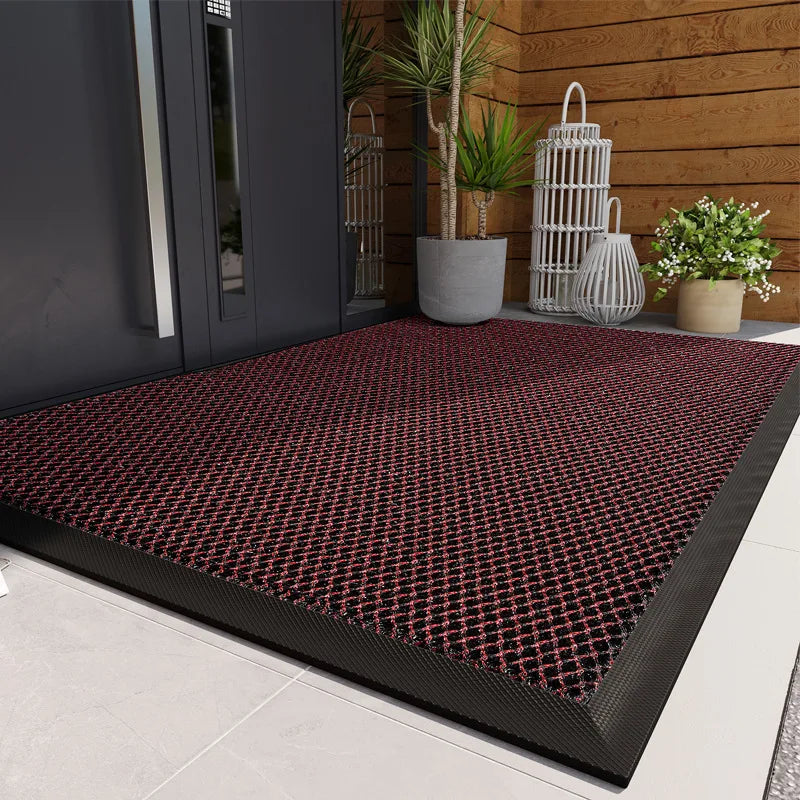Door mat S And B Enterprise; comfortable, resilient outdoor entrance carpet, non-slip, black and red pattern.