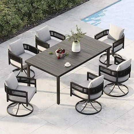 Outdoor Dining Set With Woven Metal Chairs And Cushions by S And B Enterprise