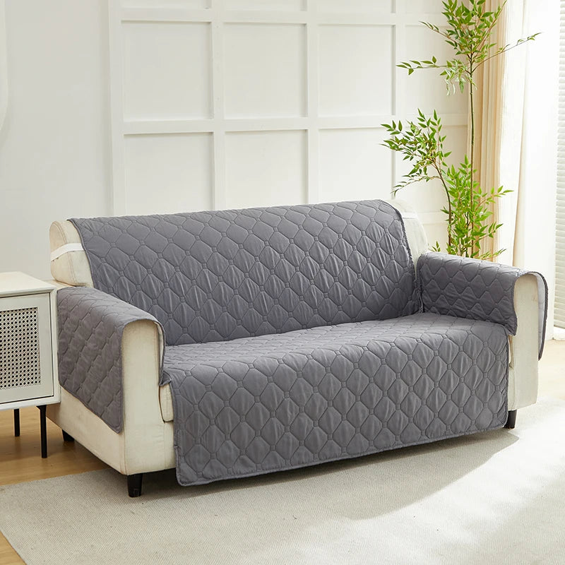 XM-Luvetoria quilted sofa cover by S And B Enterprise for a 3-seater in gray