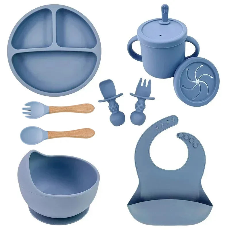 S And B Enterprise blue silicone child dish set with divided plate, suction bowl, sippy cup, wooden utensils