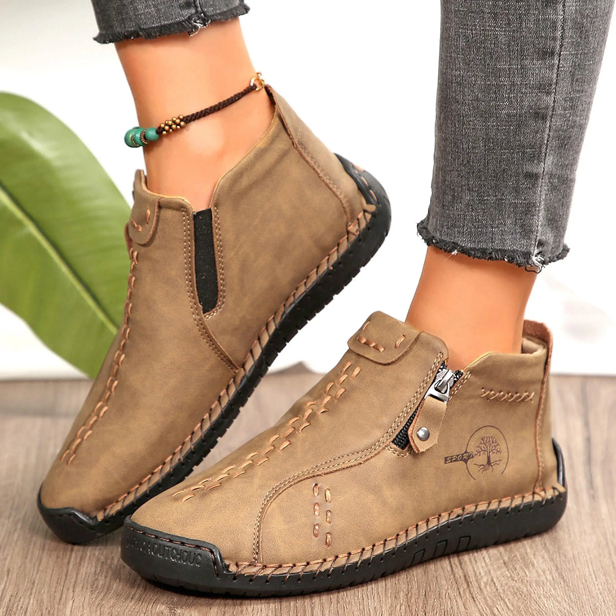 Womens tan leather ankle boots, slip-on loafers with visible stitching; pair (2)