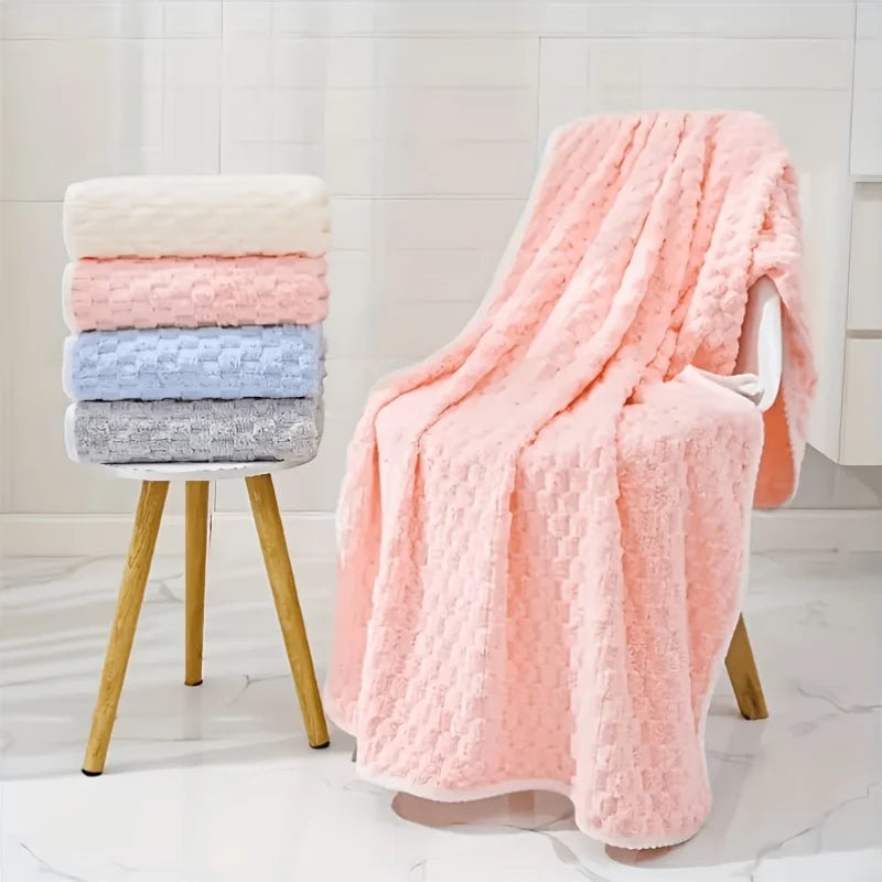 5PCS Waffle-Weave Bath Towels by S And B Enterprise in pink; towels stacked on stool with pink plush throw on chair
