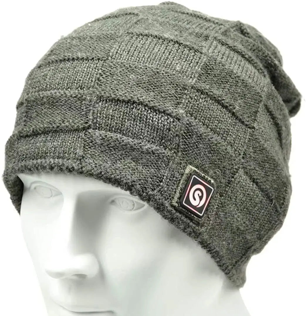 Savior heated beanie in charcoal gray knit with geometric pattern and S And B Enterprise logo.
