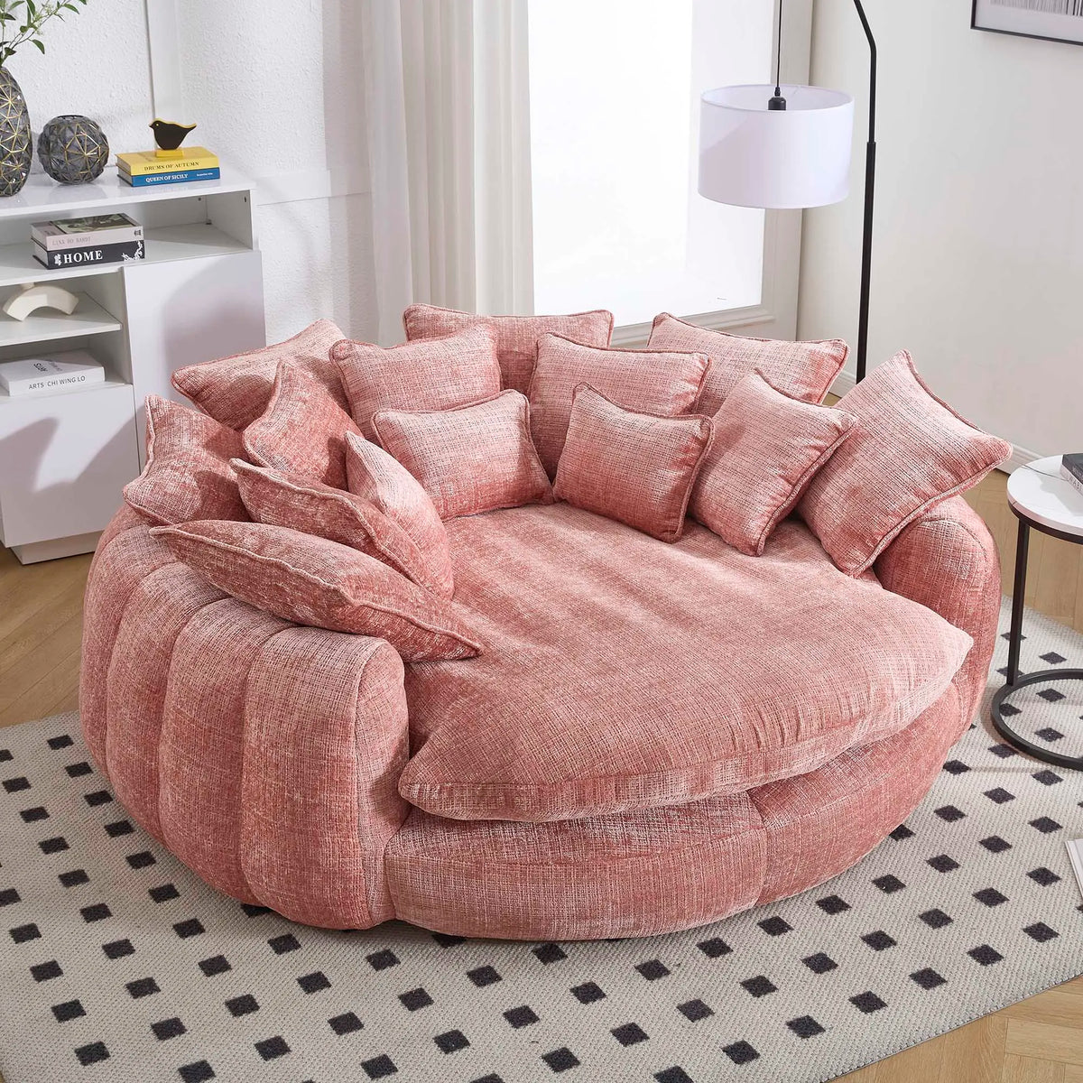 Cloud couch sleeper sofa by S And B Enterprise in pink chenille with round chaise and 14 pillows