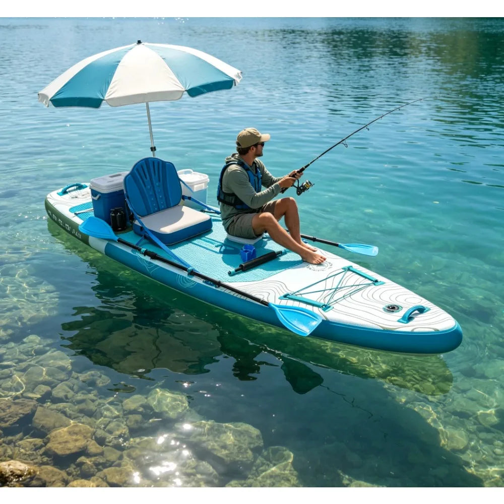 Extra wide inflatable stand up paddle board in blue and white with umbrella, cooler, and seated paddler on clear water