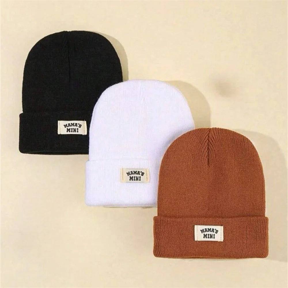 Kids solid-color knitted beanies, 3-pack in black, white, brown by S And B Enterprise