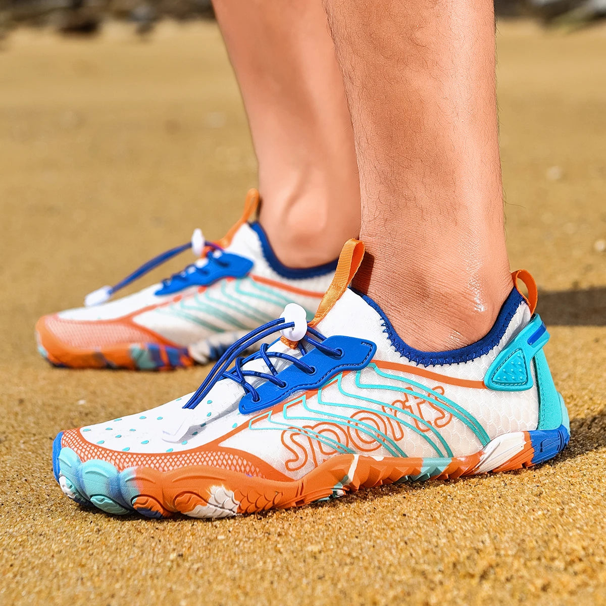 Men's quick-dry barefoot water shoes in white with blue, teal, and orange accents and a non-slip outsole.