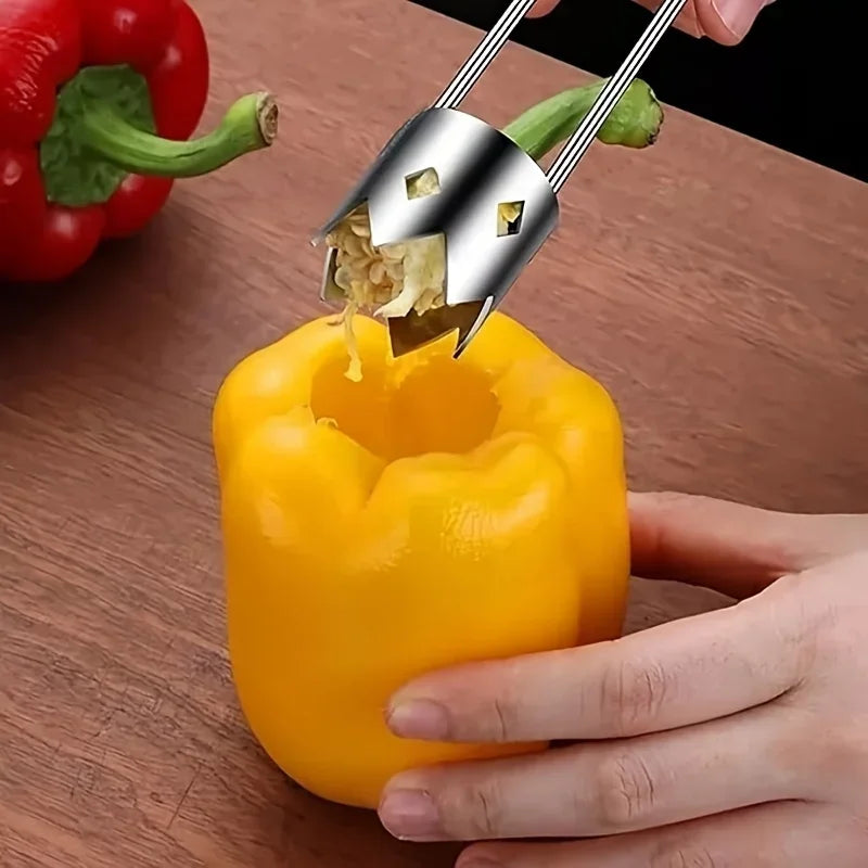 Stainless steel core remover tool by S And B Enterprise; yellow bell pepper being cored, red pepper in background.