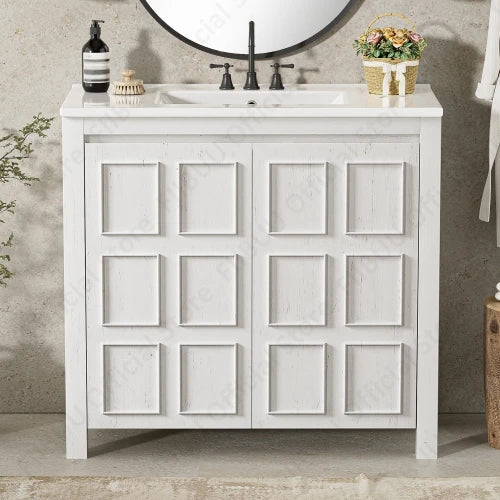 White solid-wood bathroom vanity cabinet with ceramic sink basin, 36-inch, paneled doors by S And B Enterprise