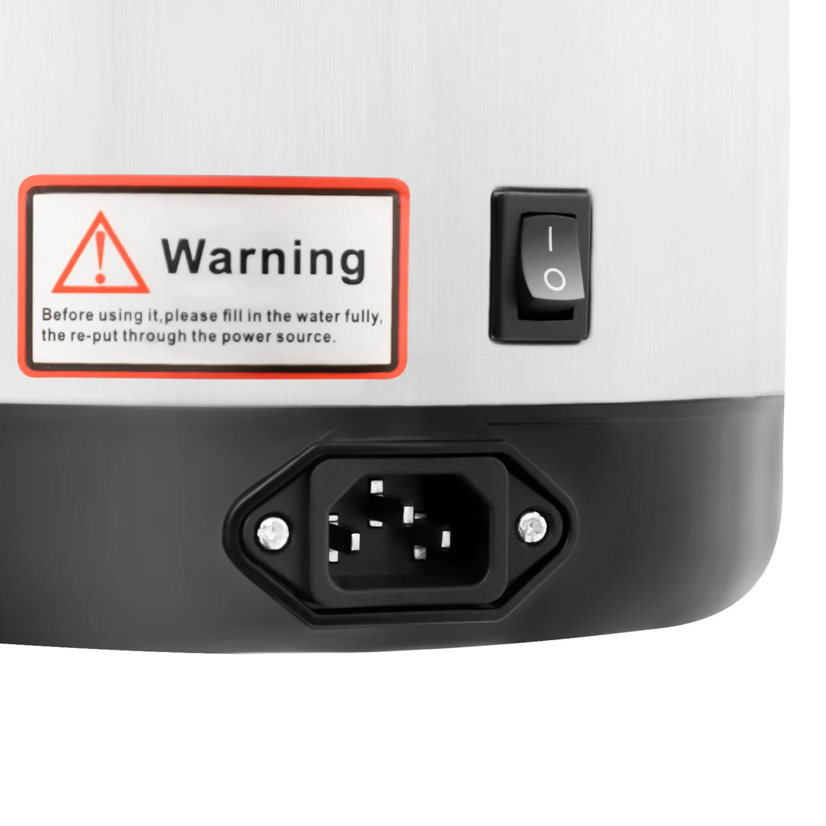Electric kettle with stainless steel body, warning sticker and on/off switch.