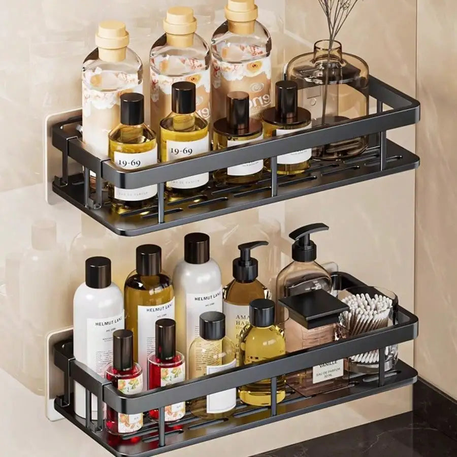 Drill-free wall-mounted bathroom shelf rack, 2-tier aluminum black, holds shampoo bottles and toiletries.