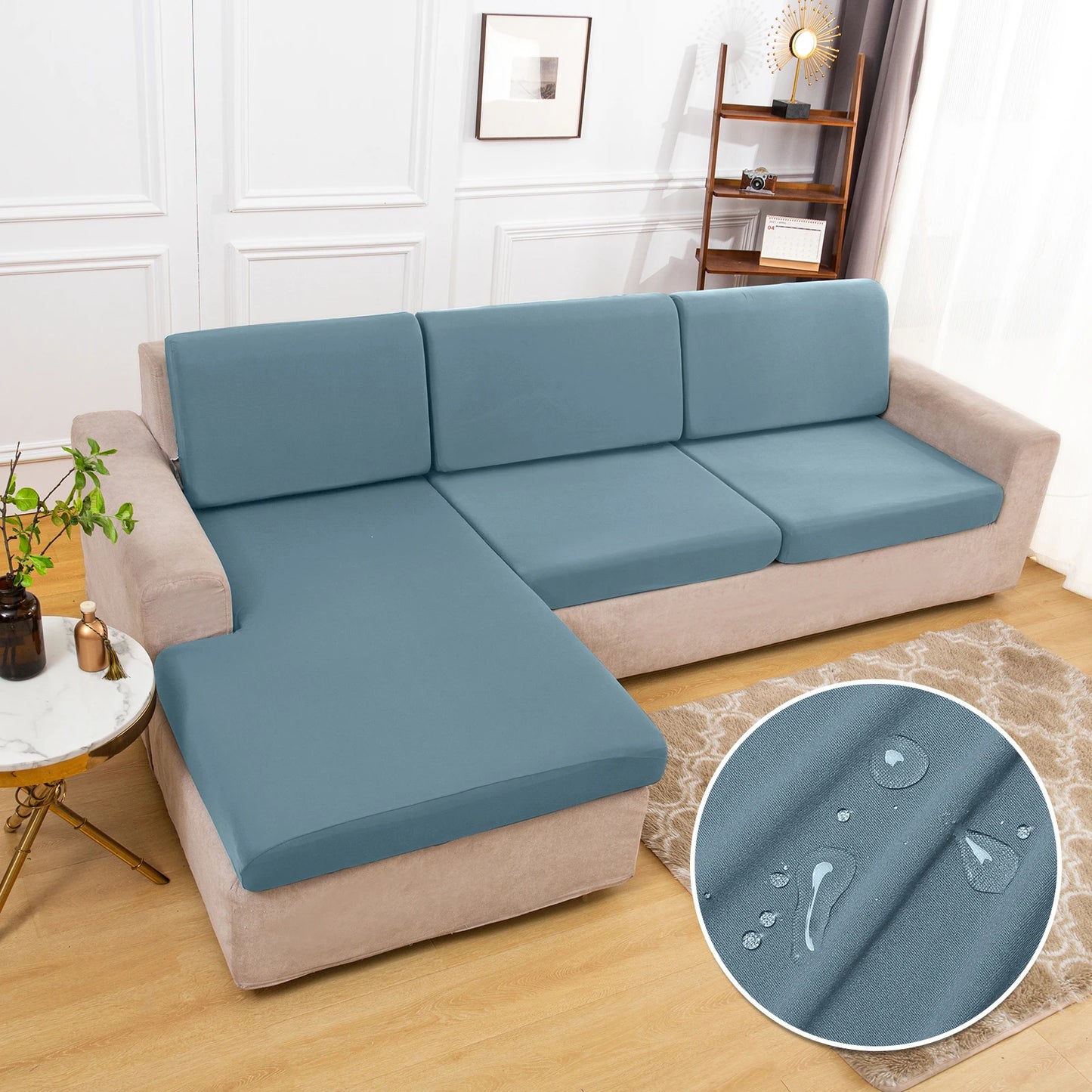 Waterproof sofa cushion covers in teal, non-slip silky stretch fabric on a beige sectional sofa