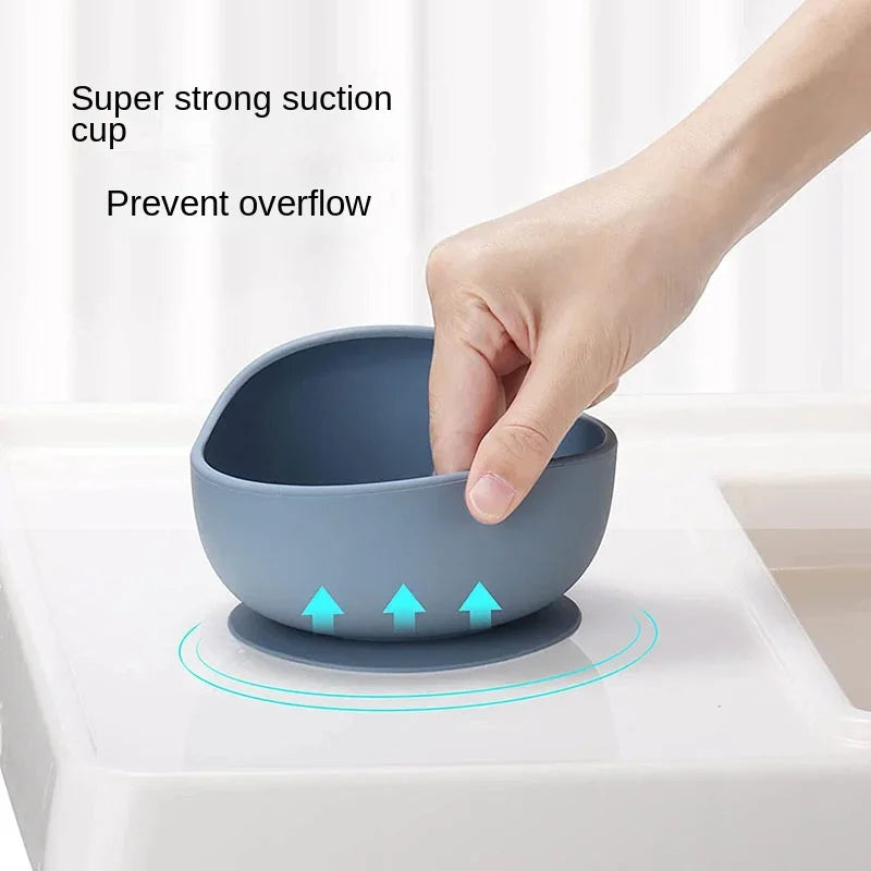 Blue silicone baby feeding bowl by S And B Enterprise with strong suction cup base