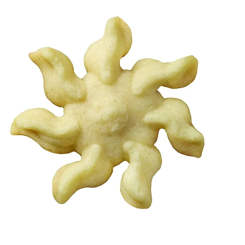 Spritz cookie sun shape with curved rays in pale golden color.