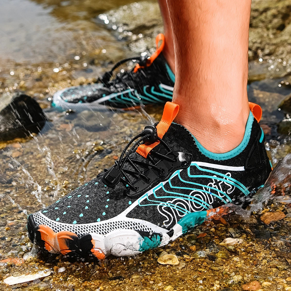 Men's quick-dry barefoot water shoes, black with teal accents and orange pull tabs, non-slip sole pair