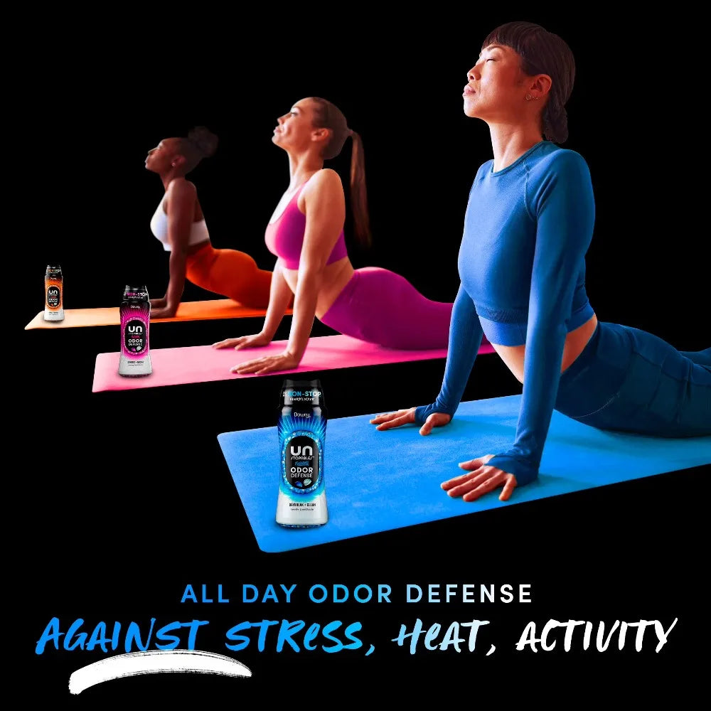 In-Wash Laundry Scent Booster Beads by S And B Enterprise; three colorful bottles (orange, pink, blue) on yoga mats.