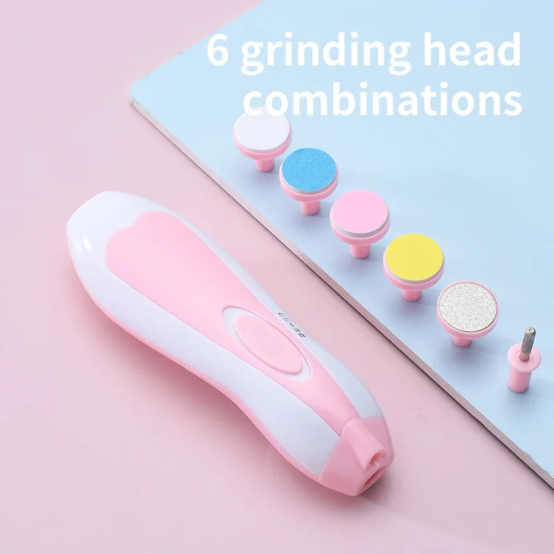 Baby grooming kit by S And B Enterprise; pink and white handheld nail trimmer with 6 interchangeable grinding heads