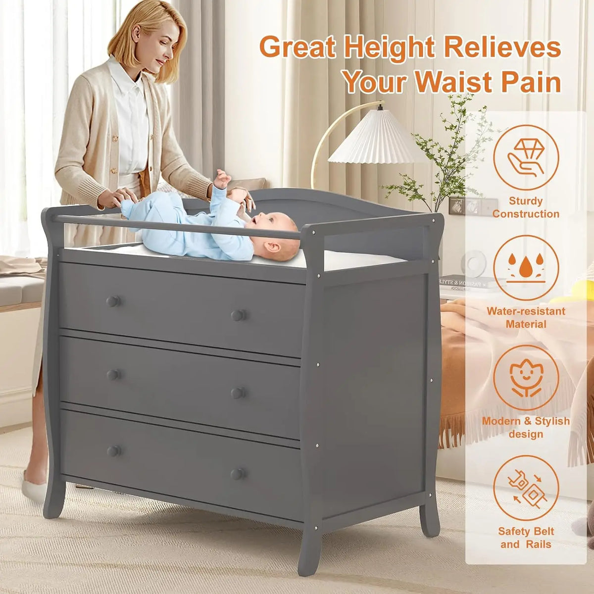 Gray wooden 3-drawer baby changing table with rails and safety belt in nursery.
