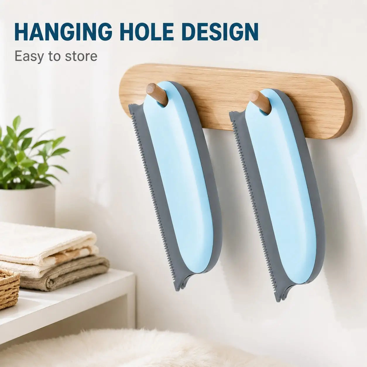 2 pcs S And B Enterprise pet hair remover brushes with handles, blue and gray, hanging on a wooden rack