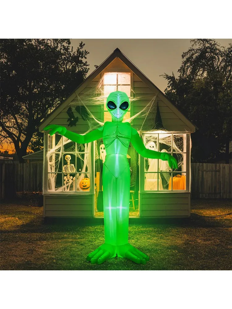 Alien Halloween inflatable, 9 ft tall, green with built-in LEDs for outdoor yard decor.