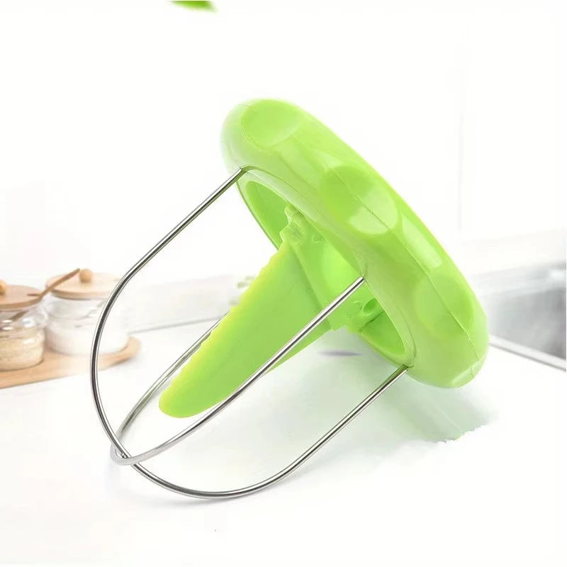 Kiwi cutter peeler slicer by S And B Enterprise; bright green plastic handle with stainless steel wire frame.