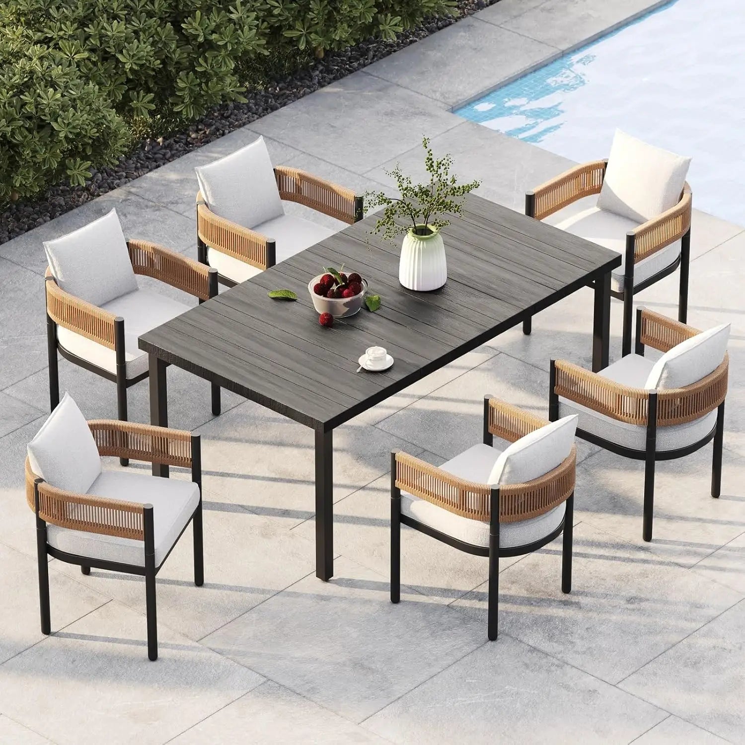Outdoor Dining Set With Woven Metal Chairs And Cushions by S And B Enterprise