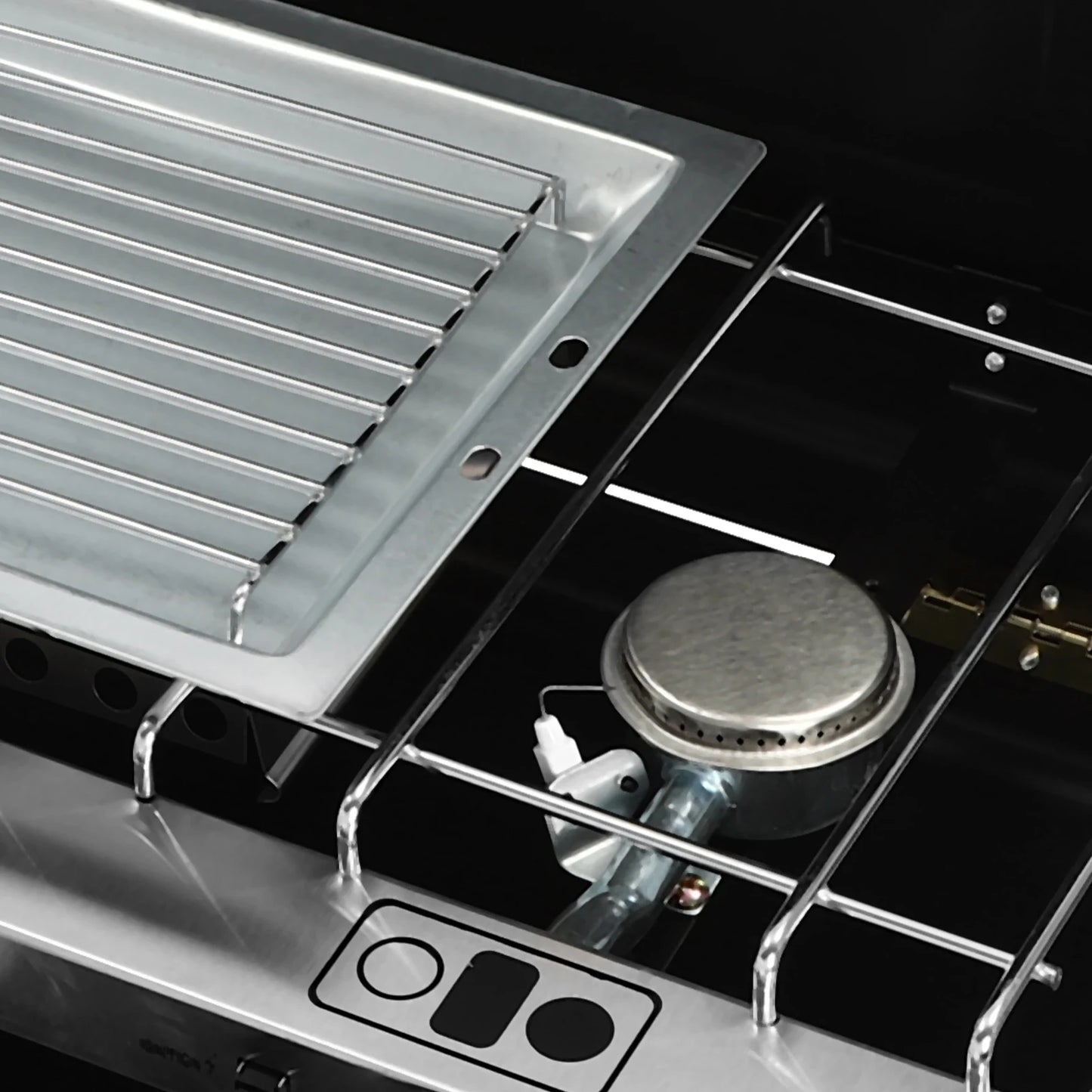 Portable table-top camping stove by S And B Enterprise with stainless steel grill rack and single burner.