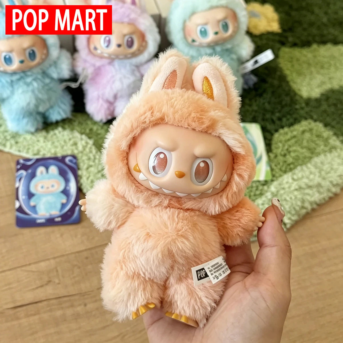 Labubu plush dolls in peach macaron color, POP MART edition.