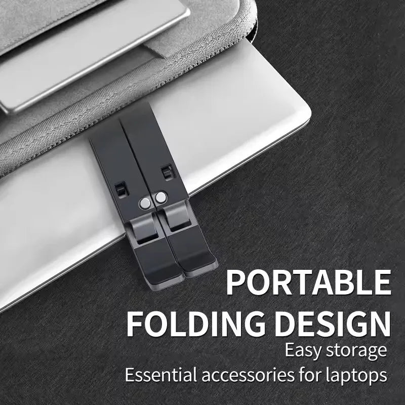 Foldable laptop stand by S And B Enterprise; black ABS plastic portable adjustable bracket for MacBook