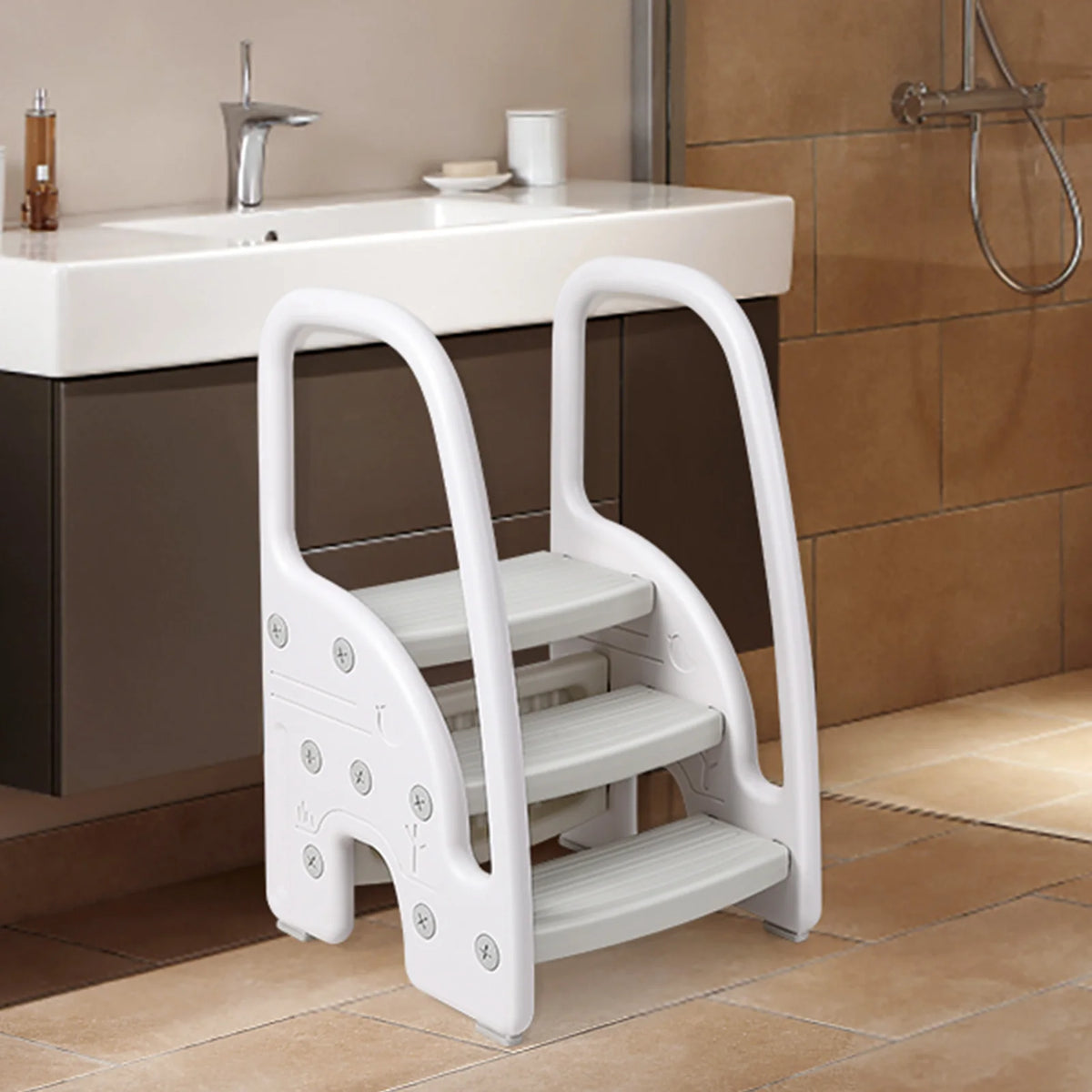 White plastic toddler 3-step stool with side handles from S And B Enterprise for bathroom or kitchen use
