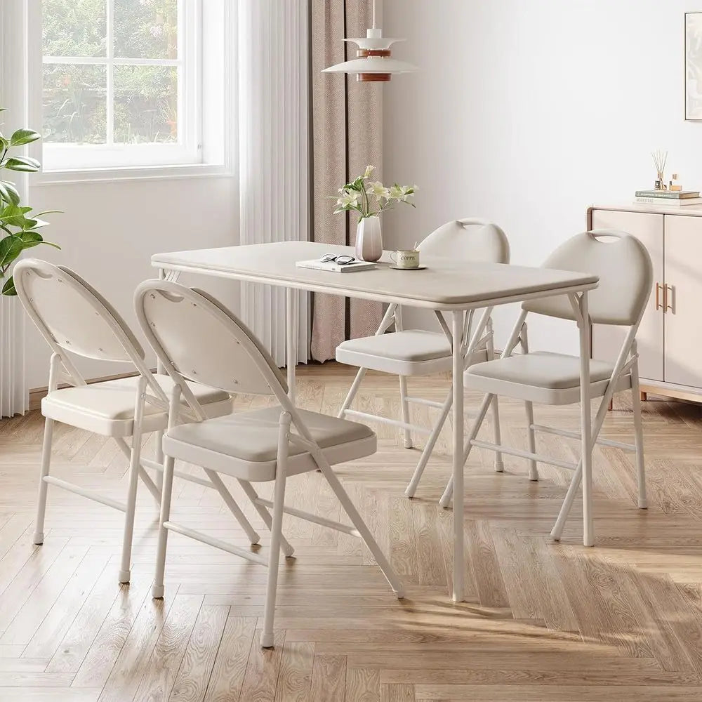 Beige portable folding card table with folding chairs in a bright dining room