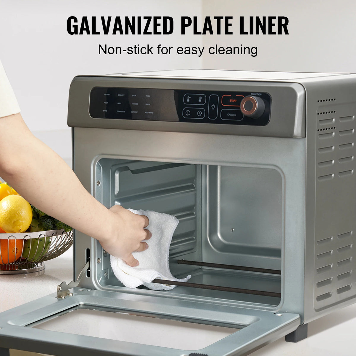 SucceBuy air fryer toaster oven, stainless steel 25L convection countertop unit with grill; person cleaning interior.