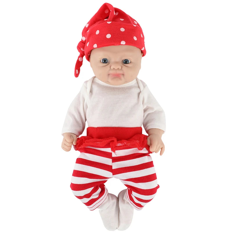 IVITA silicone reborn doll by S And B Enterprise; lifelike baby girl with red striped pants and red polka-dot headscarf.