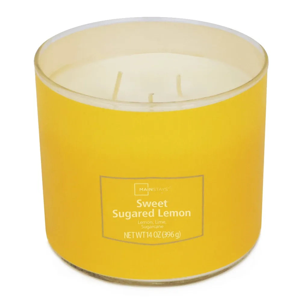 Sweet Sugared Lemon scented candle in a yellow glass jar with three wicks by Mainstays