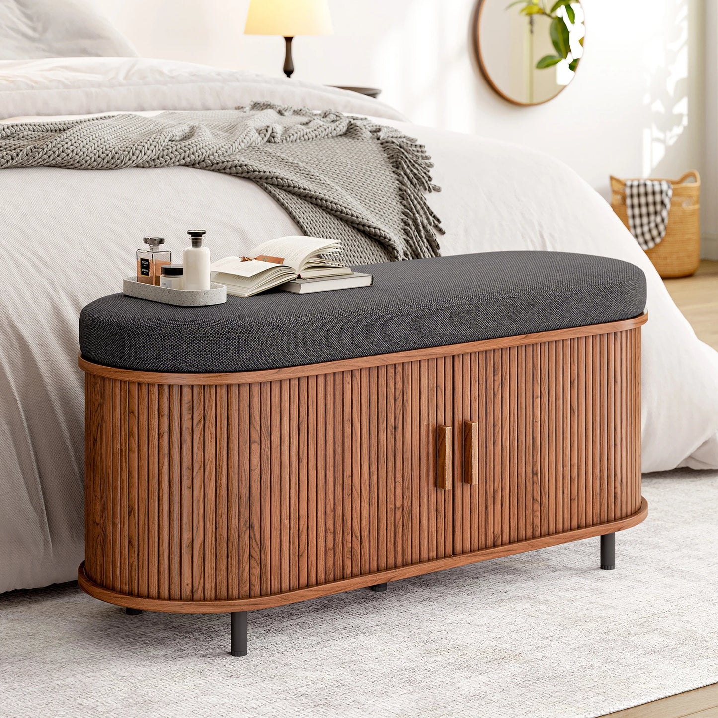 43.3-inch shoe storage bench with gray cushioned seat and wood slat base in a bedroom.