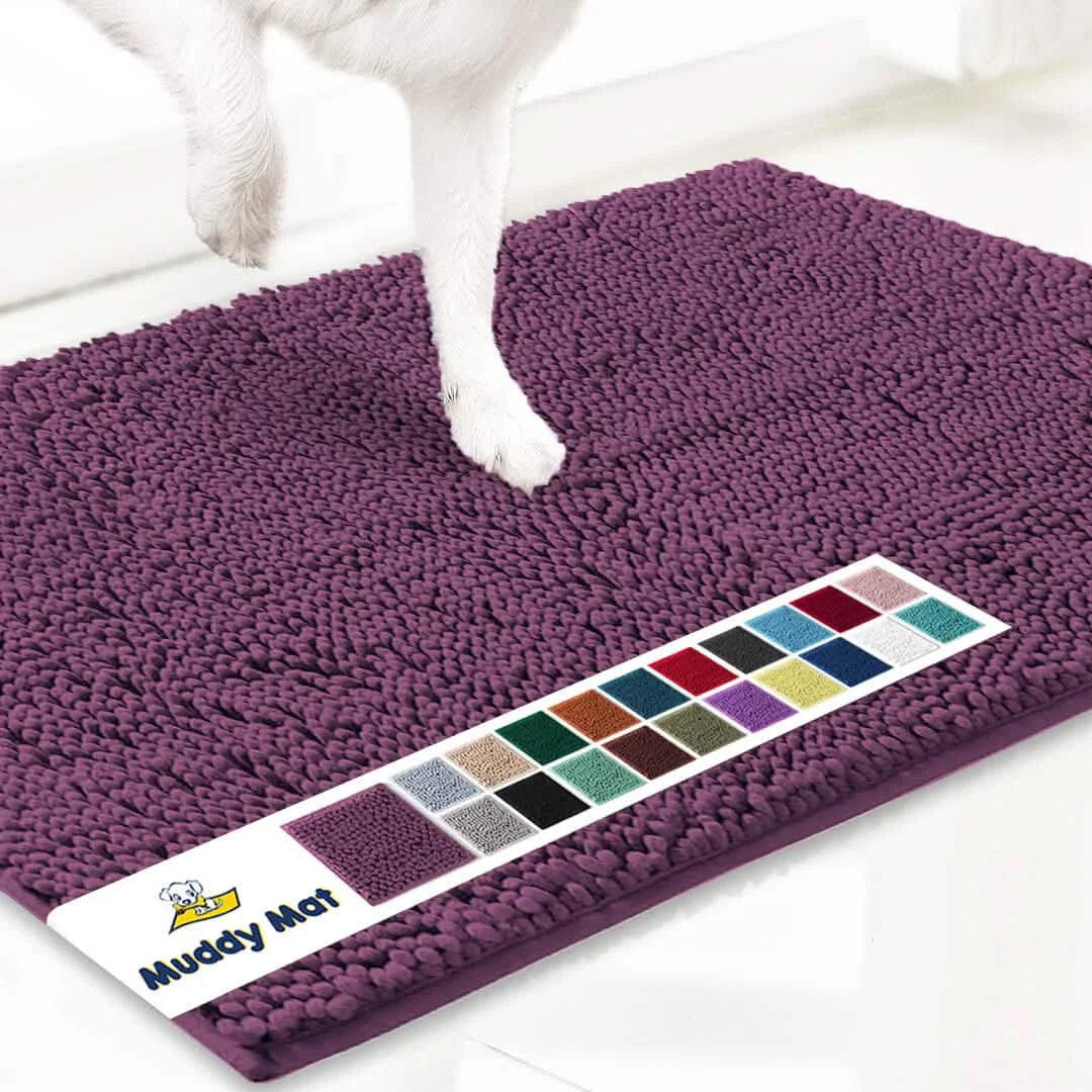 Muddy Mat doormat in purple microfiber; non-slip paw-cleaning mat for dogs and cats, label with color swatches visible.