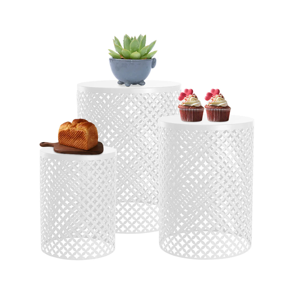 Set of 3 white metal-frame accent end tables with lattice-pattern sides; topped with a plant and cupcakes.