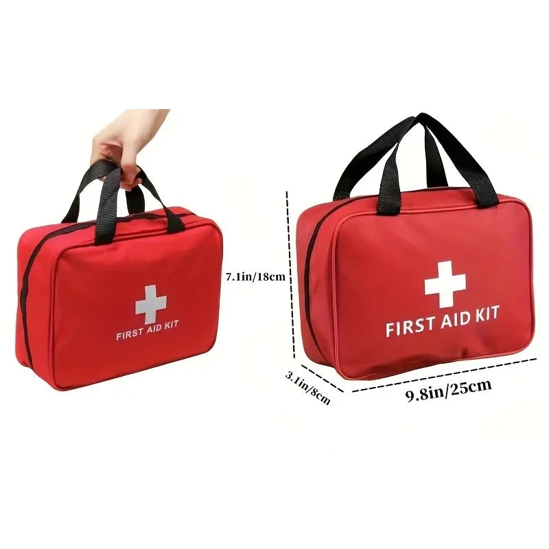 First aid kit bag, red portable with black handles and white cross.