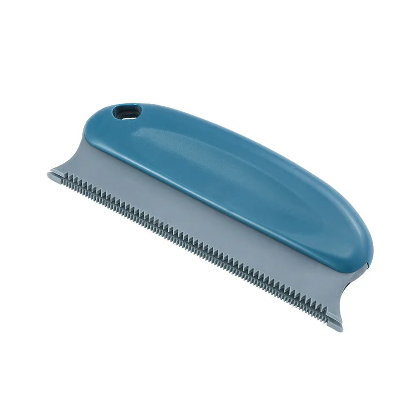 Pet hair remover brush with handle, blue top and gray serrated edge for cars, furniture, couches