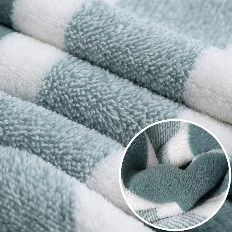 Ultra soft bath towels teal blue and white striped; plush cotton blend.