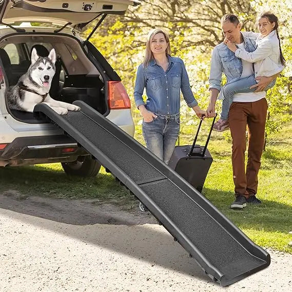 62-inch folding dog ramp for cars and SUVs, non-slip with raised side rails; dog on ramp beside a family SUV
