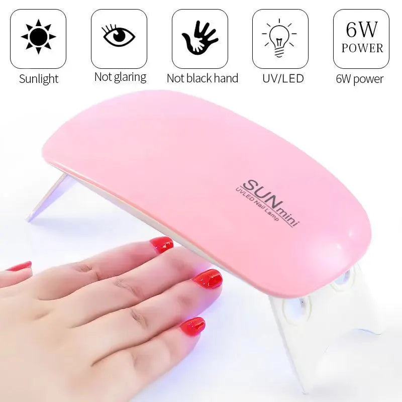 SUN mini pink UV/LED nail lamp with 6W power, shown with a hand and red nails