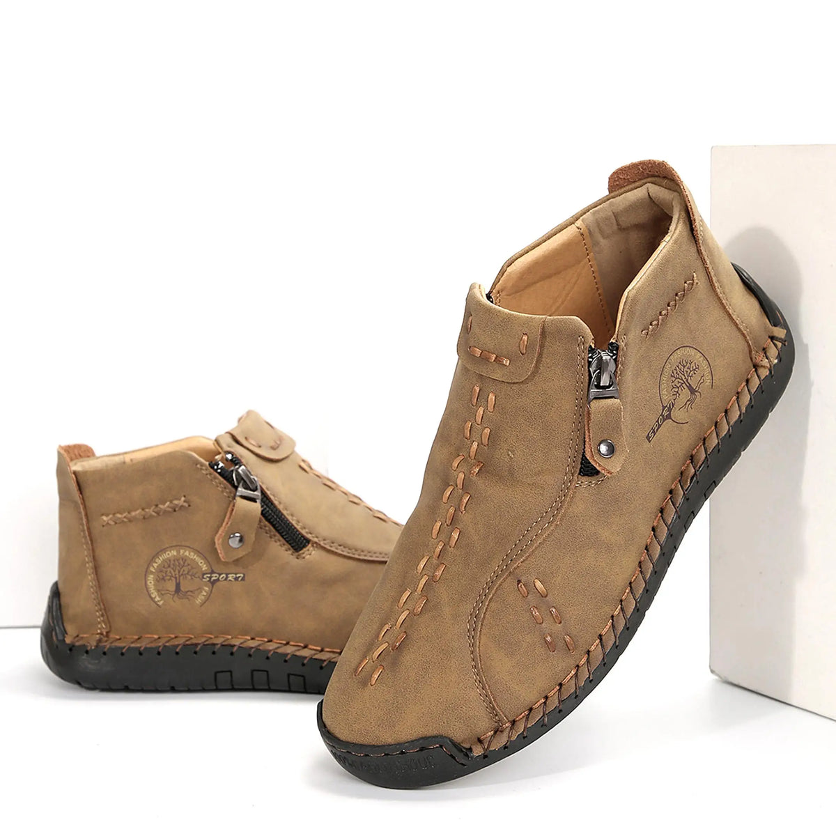 Pair of women's tan suede mid-top slip-on loafers by S And B Enterprise; lightweight walking shoes