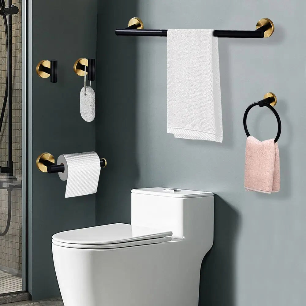 Bathroom hardware 3-item set by S And B Enterprise black/gold wall-mounted towel bar, towel ring, toilet paper holder.
