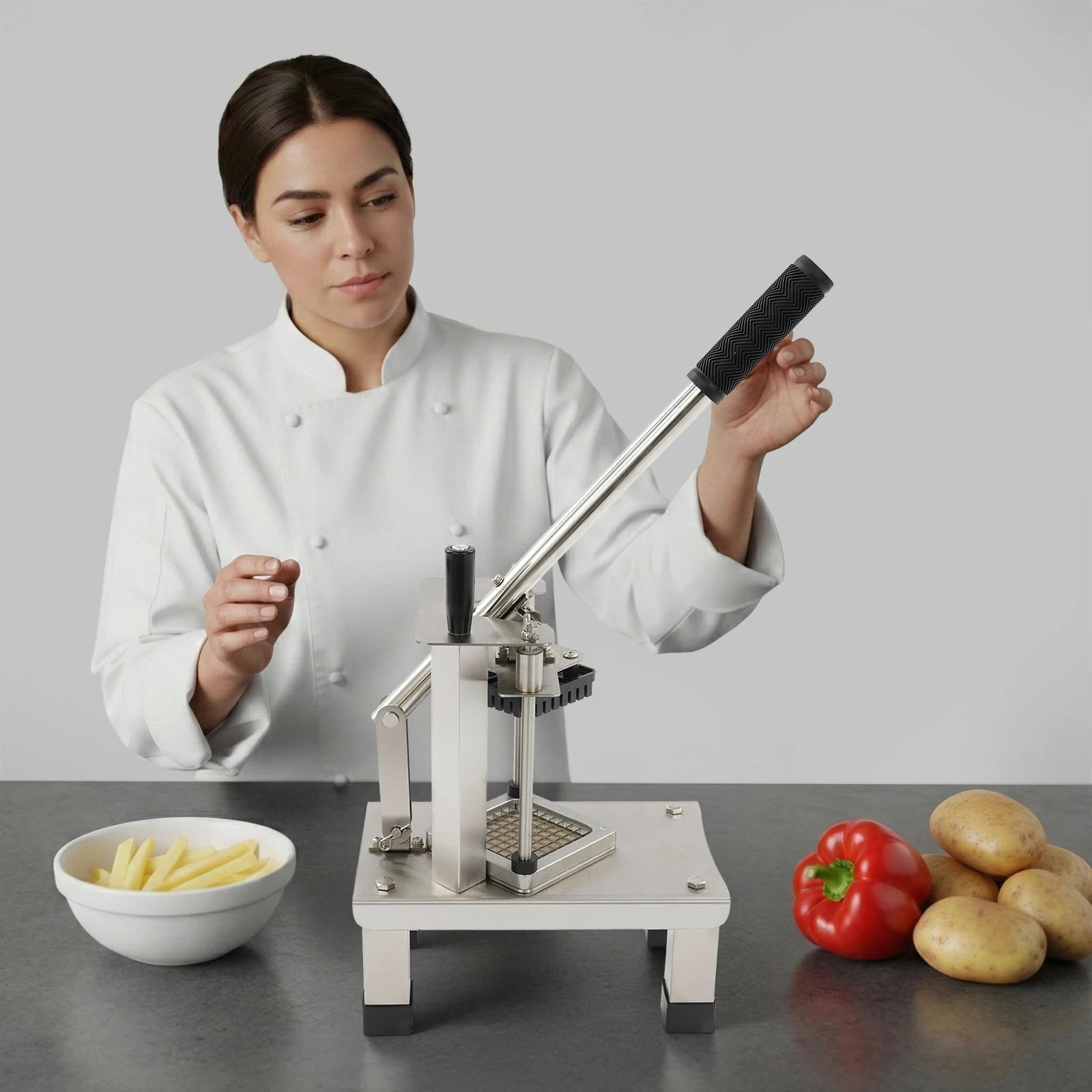 French fry cutter with stainless steel blades and a black ergonomic handle; professional potato slicer