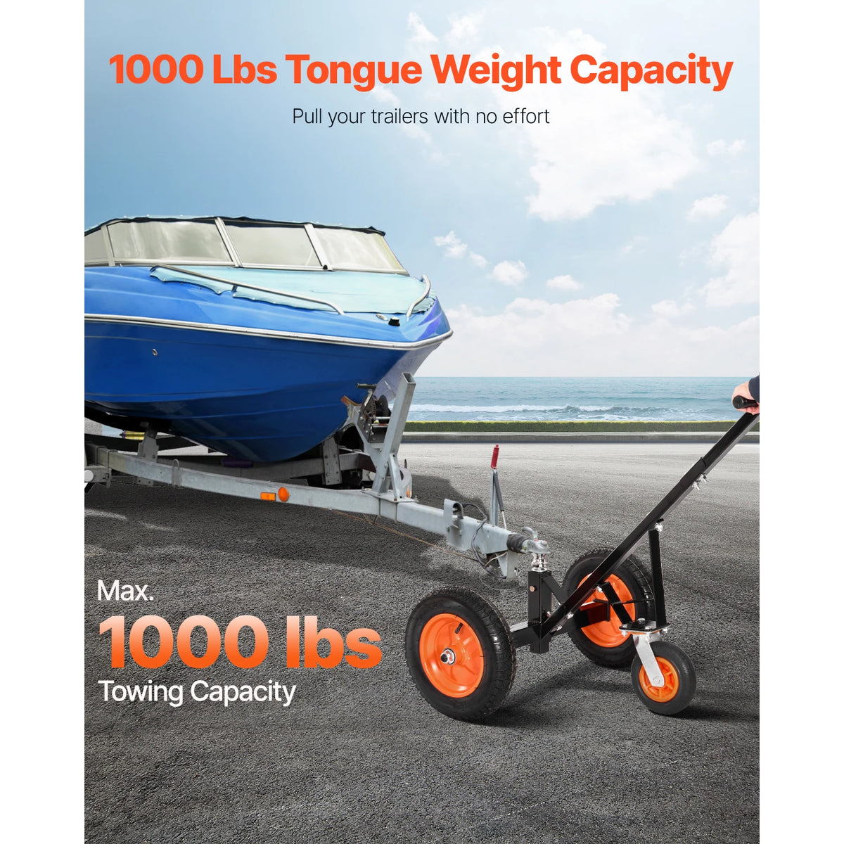 S And B Enterprise trailer dolly, carbon steel with orange wheels, moving a blue boat on a silver trailer
